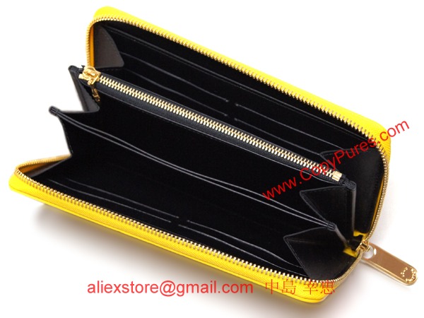 ルイヴィトン　LOUIS VUITTON　ヴィトン　財布　LV　ヴェルニ　ドット　インフィニティ　ヤヨイ・クサマ　LV　ラウンドジップ長財布　ジッピーウォレット　ジョーヌ　M91571